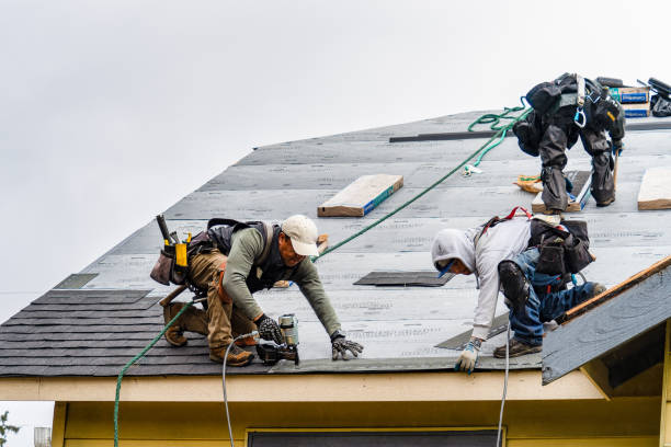 Professional Gutter Installation technician working in Peconic, NY